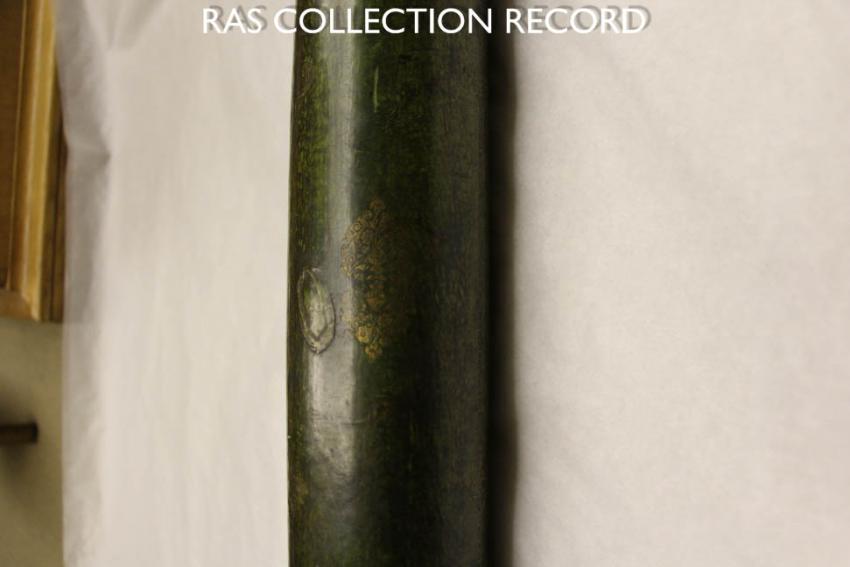 Cardboard tube telescope zoomed-in on gold decoration